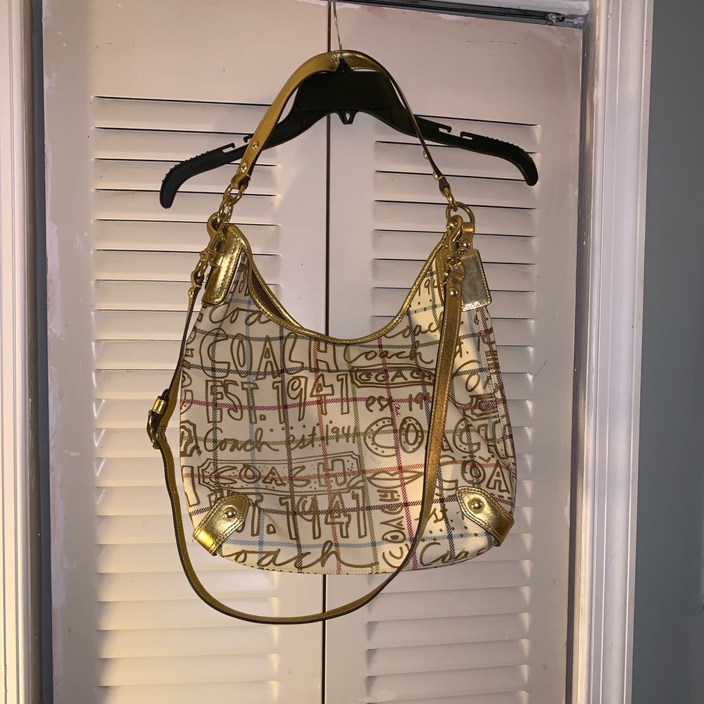 Gold coach cross body or shoulder purse